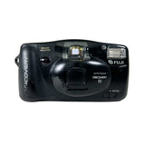 Black Fujifilm camera on a white background