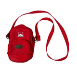 Red crossbody bag with a strap on a white background