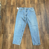 Vintage 90s Levis 560 Mid-Wash Denim Jeans