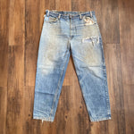 Vintage 1994 Levi's 550 Distressed Orange Tab Jeans