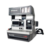 Polaroid Sun 600 camera on a white background