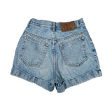 Pair of blue denim shorts with a brand logo on a white background