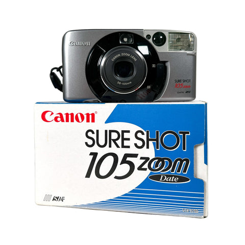Canon Sure Shot 105 Zoom camera with its packaging on a white background