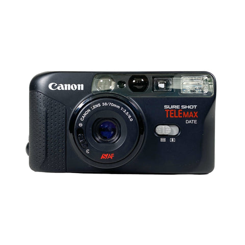 Canon digital camera with 'Sure Shot Telemax' on a white background