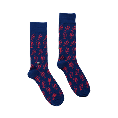Pair of blue socks with crawfish pattern on a white background