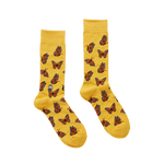 Yellow socks with butterfly pattern on a white background