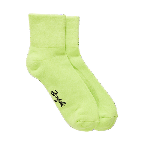 Light green sock with brand logo on a white background