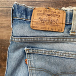 Vintage 1994 Levi's 550 Distressed Orange Tab Jeans