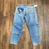 Vintage 1994 Levi's 550 Distressed Orange Tab Jeans