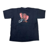 A black short-sleeve graphic t-shirt laid flat on a white background, featuring a 'The Tyler Effect' movie print on the back with three character portraits and the movie title.