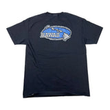 A black short-sleeve t-shirt laid flat on a white background, featuring a blue and silver graphic of the state of Hawaii with the word 'HAWAII' printed across the chest.