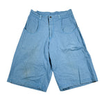 Blue denim shorts on a white background