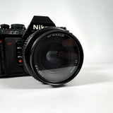 Vintage 1986 Nikon N2020 SLR with AF Nikkor 35–70mm Lens Film Camera