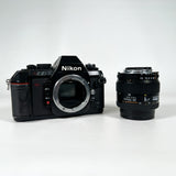 Vintage 1986 Nikon N2020 SLR with AF Nikkor 35–70mm Lens Film Camera