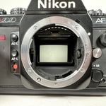 Vintage 1986 Nikon N2020 SLR with AF Nikkor 35–70mm Lens Film Camera