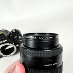 Vintage 1986 Nikon N2020 SLR with AF Nikkor 35–70mm Lens Film Camera