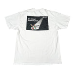 White t-shirt with a black label on a white background
