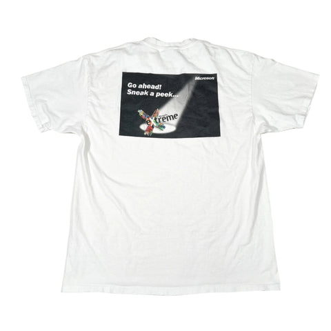 White t-shirt with a black label on a white background