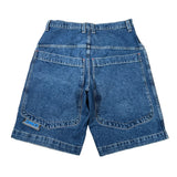 A pair of vintage blue denim shorts shown from the back, featuring two large patch pockets and a small blue brand patch on the lower left leg, laid flat on a white background.