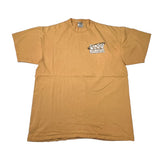 A tan short-sleeve t-shirt with a small 'Snoopy BUZZ' graphic on the left chest, laid flat on a white background.