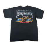 A black short-sleeve t-shirt laid flat on a white background, featuring a large graphic print on the front with the text 'Daytona Beach Supersport' in stylized lettering, a skeleton riding a flame-traced motorcycle, and '2006' printed below.
