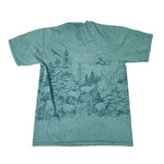 Teal t-shirt with nature graphic on a white background
