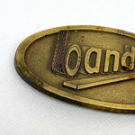 Vintage 90's Bandag Tire Company Brass Logo Belt Buckle