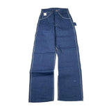 A pair of dark blue denim jeans laid flat on a white surface, showing the front and back legs with visible seam details and a small white brand label near the waistband.