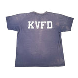 Blue t-shirt with 'KVFD' printed on the back against a white background