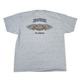 Gray t-shirt with brand logo and text on a white background