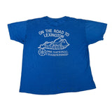 Blue t-shirt with white text and graphic on a white background