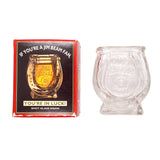 Clear Jim Beam shot glass with packaging on a white background