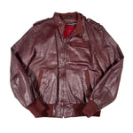 Brown leather jacket on a white background