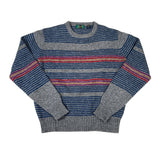 Striped sweater with blue, gray, and multicolor pattern on a white background