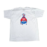A white short-sleeve t-shirt laid flat on a white fabric background, featuring a red and blue graphic on the back with the text 'COVER THE KILLER' and a dripping paint bottle design.