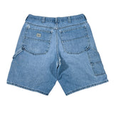 Blue denim shorts on a white background