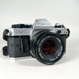 Vintage 1981 Canon AE-1 Program 35mm SLR Kit w/ FD 50mm f/1.8, FD 28mm f/2.8 & Albinar 75-300mm Lens 35mm Film Camera