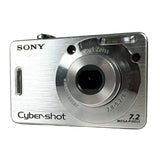 Silver Sony Cyber-shot camera on a white background