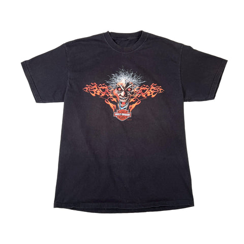 Black t-shirt with a graphic design on a white background