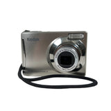 Silver Kodak camera with a black strap on a white background