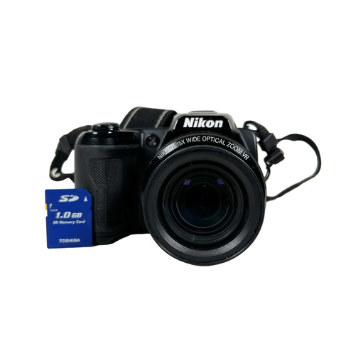 Nikon camera with a Toshiba SD card on a white background