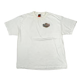 White t-shirt with a logo on a light gray background