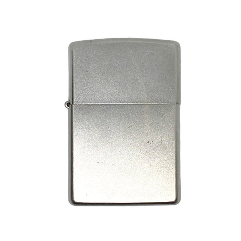 Metallic lighter on a light gray background