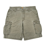 Green cargo shorts on a white background