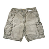 A pair of light beige cargo shorts with multiple utility pockets, laid flat on a white background.