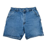 Blue denim shorts on a white background