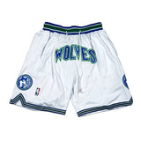 White basketball shorts with 'Wolves' text and logos on a white background
