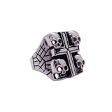 Silver ring with skull design on a white background