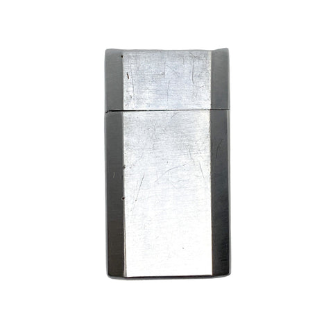 Metallic lighter on a textured white background