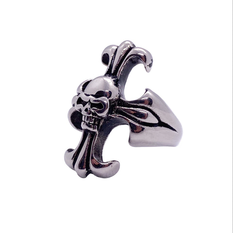 Silver ring with skull and crossbones design on a white background